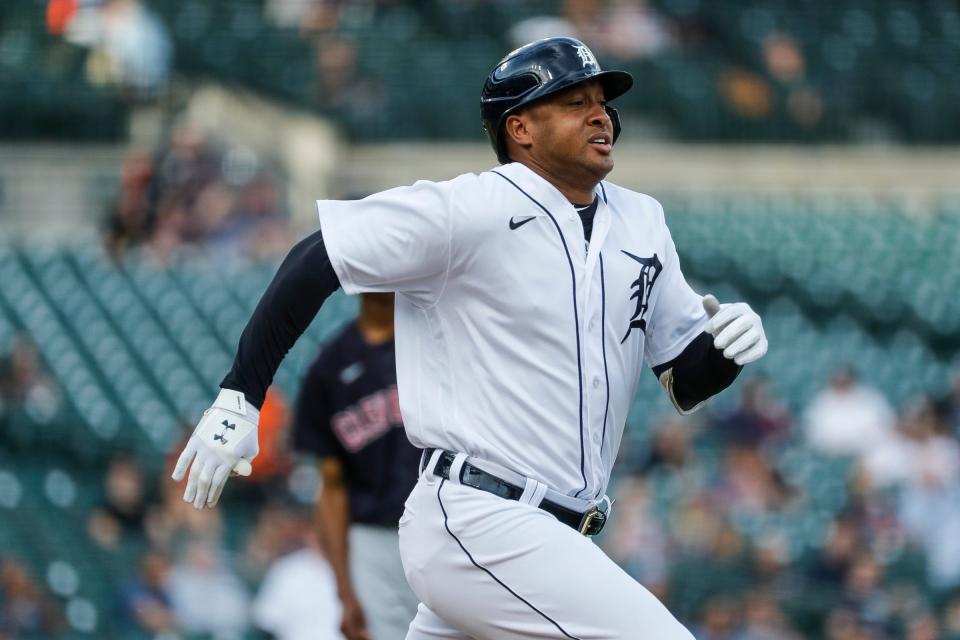 Tigers second baseman Jonathan Schoop runs towards first base after batting against Cleveland during the first inning at Comerica Park on Wednesday, May 26, 2021.