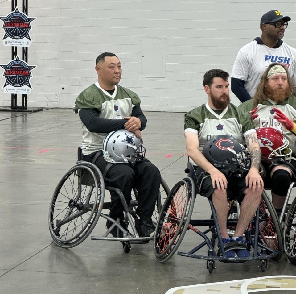 Jason Rainey, a Flint native who now lives in Fort Worth, Texas, plays quarterback for the Army's team in the USA Wheelchair Football League All Star game Friday, April 26 at Huntington Place during the NFL draft.