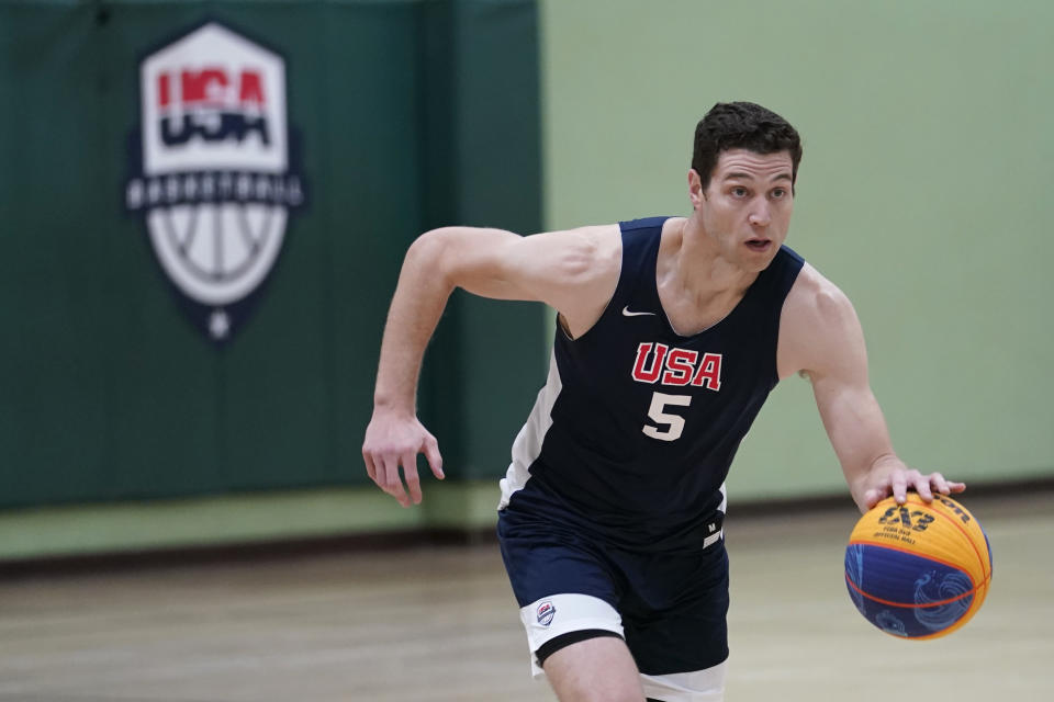 FILE - Jimmer Fredette practices for the USA Basketball 3x3 national team, Monday, Oct. 31, 2022, in Miami Lakes, Fla. The U.S. learned Wednesday, Nov. 1, 2023, that it has clinched spots at the Paris Games in both men’s and women’s 3x3 basketball. "Making it to the Olympics, that’s what it’s been all about for us,” said Fredette. (AP Photo/Lynne Sladky, File)