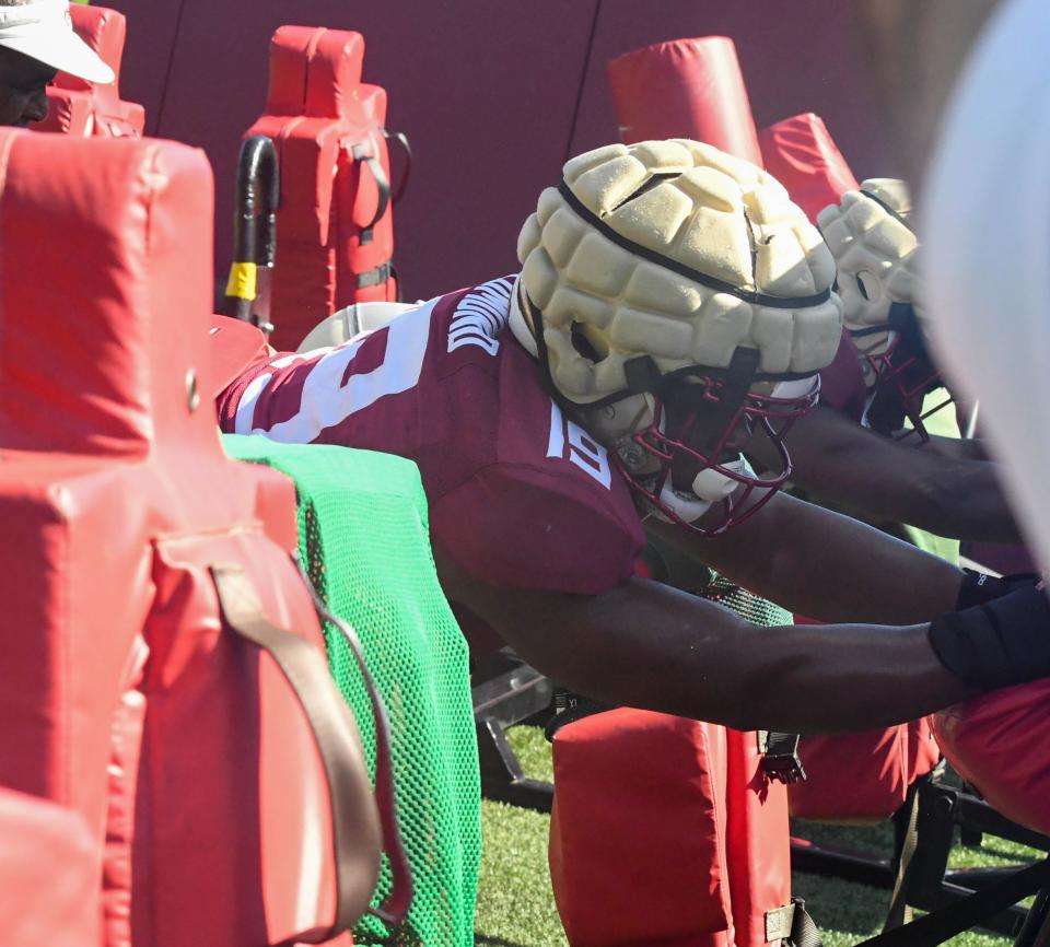 Florida State football players take part in drills during an FSU spring football practice of the 2023 season on Thursday, April 13, 2023.