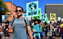 Activists march through downtown Los Angeles in November 2019 in a climate change rally addressed by teenage Swedish activist Greta Thunberg