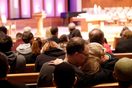 A candlelight vigil is held at Rancho Bernardo Community Presbyterian Church for victims of a shooting incident at the Congregation Chabad synagogue in Poway, north of San Diego, California, U.S. April 27, 2019. REUTERS/John Gastaldo