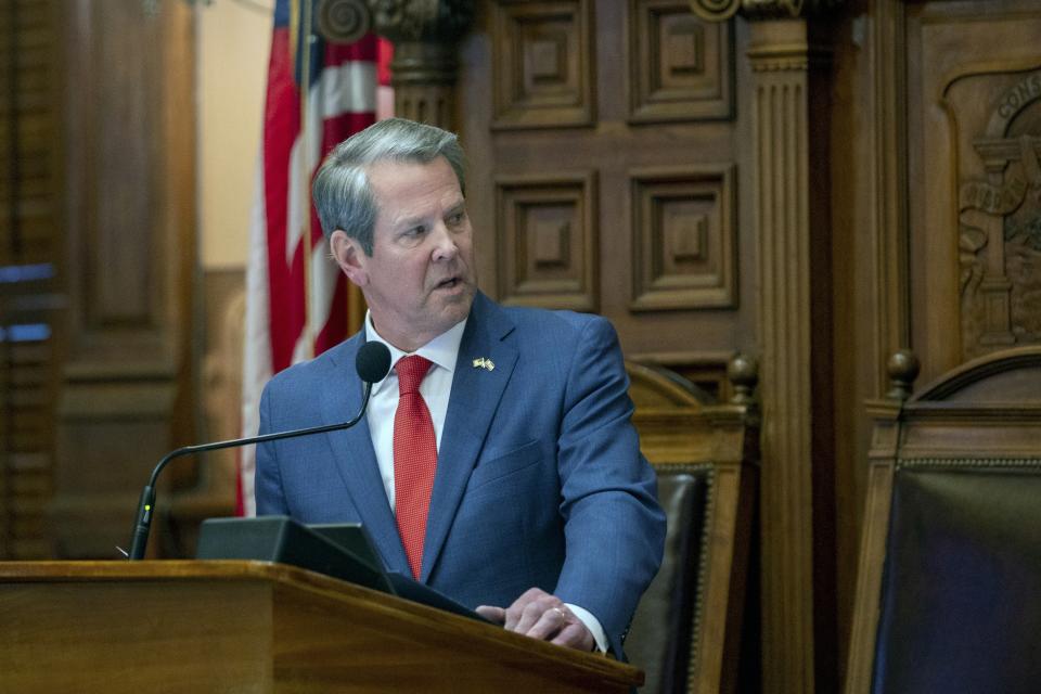 FILE -- Georgia Gov. Brian Kemp addresses the state House of Representatives at the Capitol in Atlanta on Thursday, March 28, 2024. The Republican Kemp's political committee announced on Tuesday, May 14, 2023 that it would spend $500,000 to support the election of Georgia Supreme Court Justice Andrew Pinson in his nonpartisan race against John Barrow. (Arvin Temkar/Atlanta Journal-Constitution via AP, file)