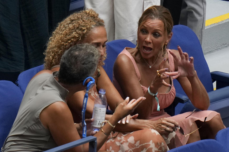 Vanessa Williams, right, talks with friends while watching play between Novak Djokovic, of Serbia, and Taylor Fritz, of the United States, during the quarterfinals of the U.S. Open tennis championships, Tuesday, Sept. 5, 2023, in New York. (AP Photo/Seth Wenig)