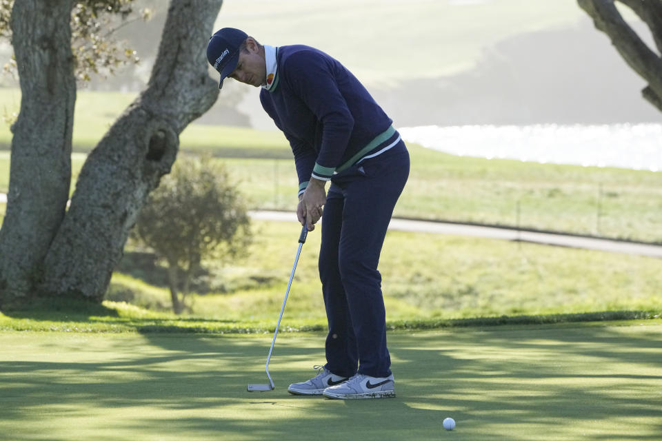 Justin Rose, of England, follows his putt on the 16th green of the Pebble Beach Golf Links during the fourth round of the AT&T Pebble Beach Pro-Am golf tournament in Pebble Beach, Calif., Monday, Feb. 6, 2023. (AP Photo/Godofredo A. Vásquez)