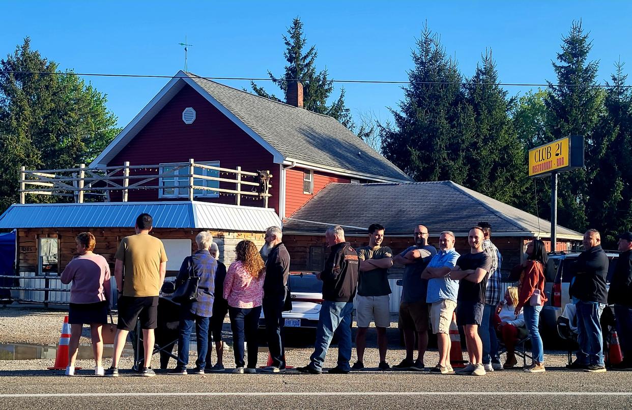 A line formed outside of Club 21 in Goodells on Wednesday, May 8, 2024, ahead of reported filming for the reality TV show "Bar Rescue."