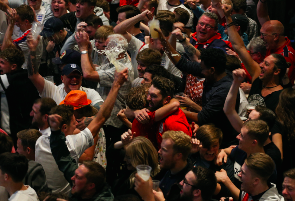 <p>England fans celebrate at Ashton Gate stadium in Bristol.<br>(Picture: SWNS) </p>