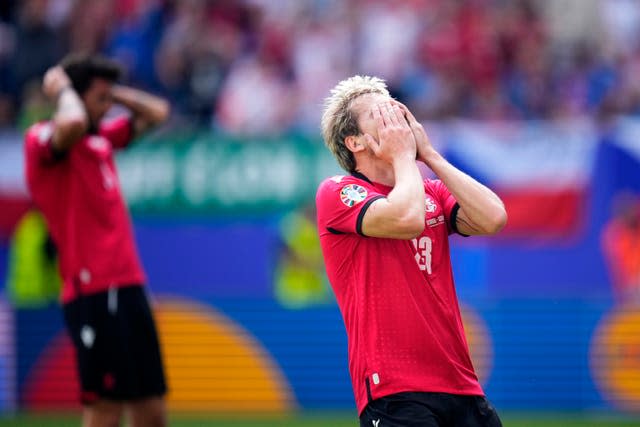 Georgia’s Saba Lobjanidze reacts after a missed chance to score