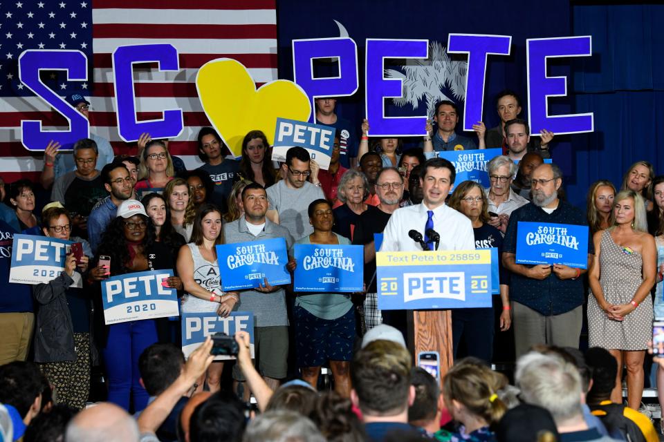 FILE - In this May 5, 2019 file photo, Democratic presidential contender Pete Buttigieg holds a town hall in North Charleston, South Carolina. Democratic presidential contender Pete Buttigieg is picking up his first endorsement among South Carolinaâ€™s black lawmakers as attention in the early voting contest turns toward more diverse states. Buttigiegâ€˜s campaign announced Wednesday that the former South Bend, Indiana, mayor would be receiving backing from state Rep. JA Moore, a Democrat from Charleston. (AP Photo/Meg Kinnard)