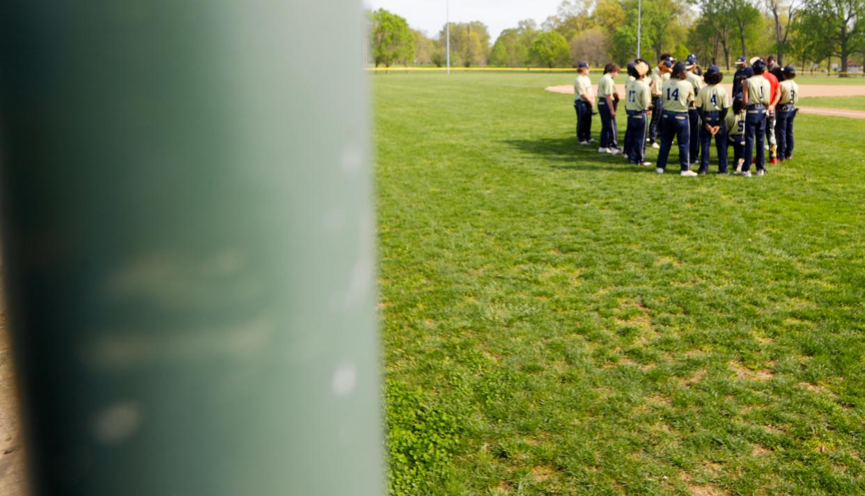 Shawnee coach Timothy Ladd Sr. talks to his team before the game against Francis Parker.