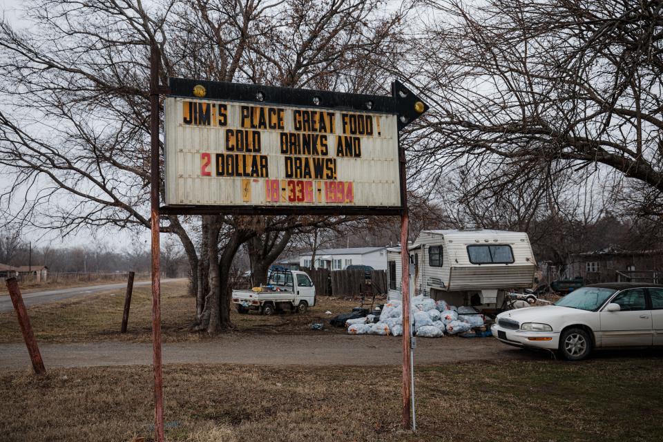 A sign in front of Jim's Place in Whippoorwill, Okla.