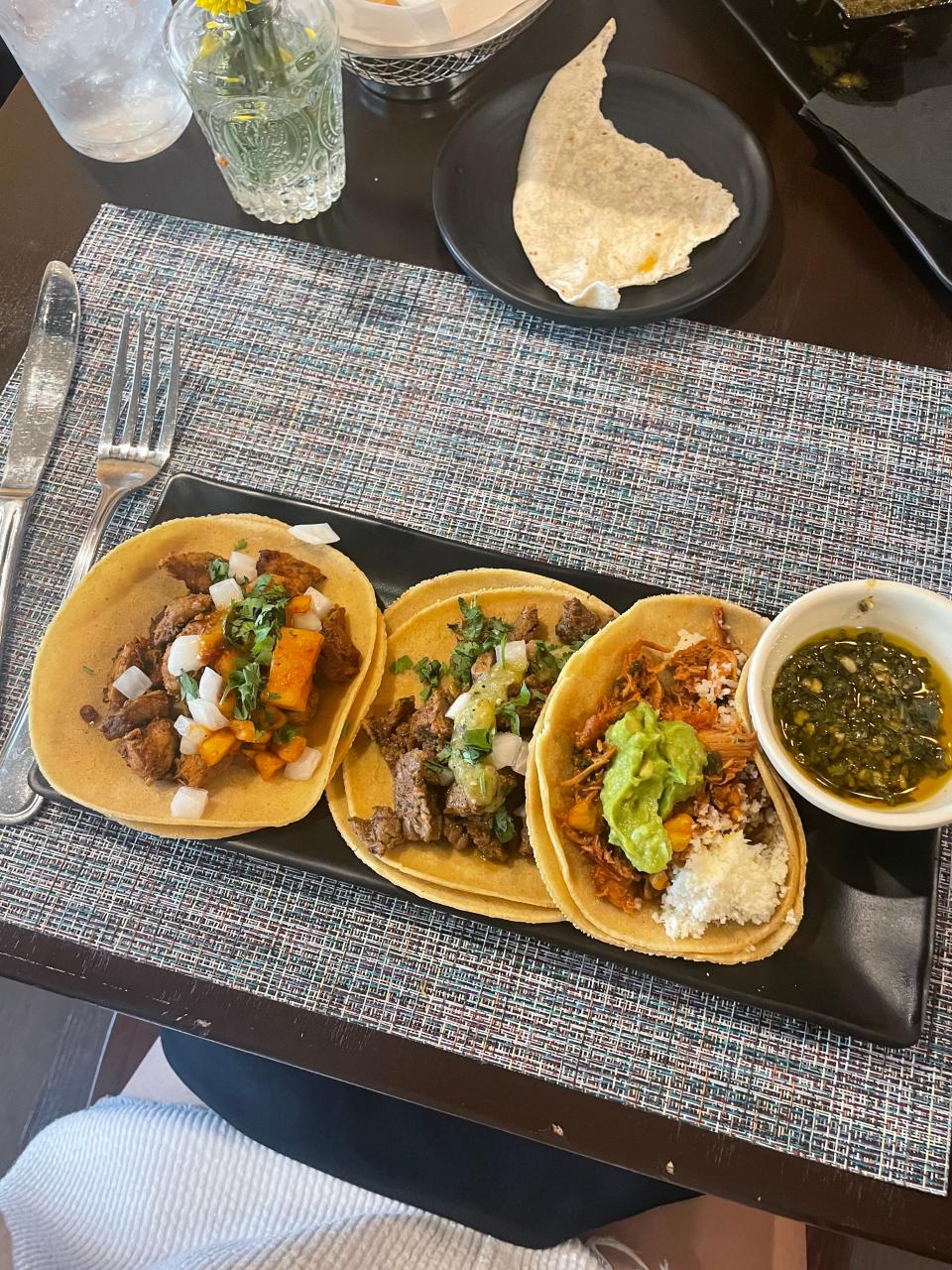 An array of tacos from The Battleground in Kent, including the asada taco, pollo tinga taco and the al pastor taco.