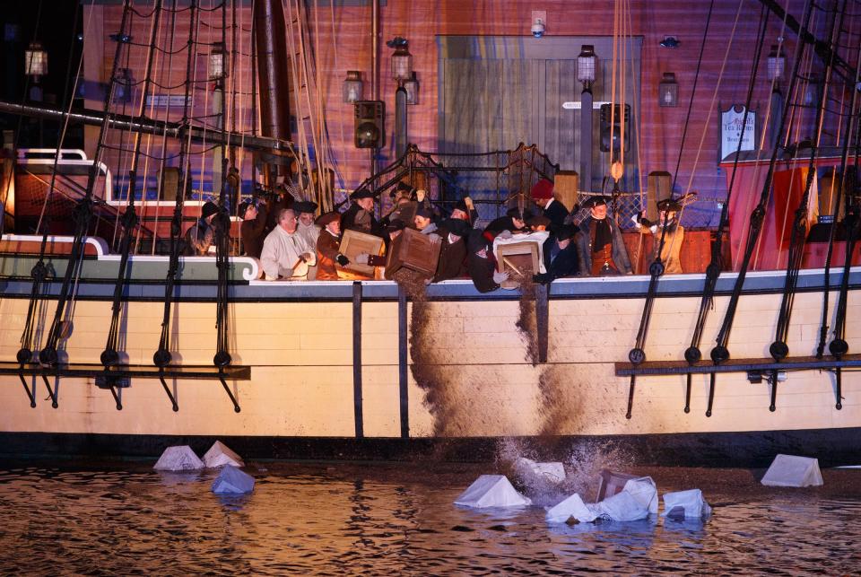 The splashy scene at a past annual Boston Tea Party Reenactment at the Boston Tea Party Ships & Museum.