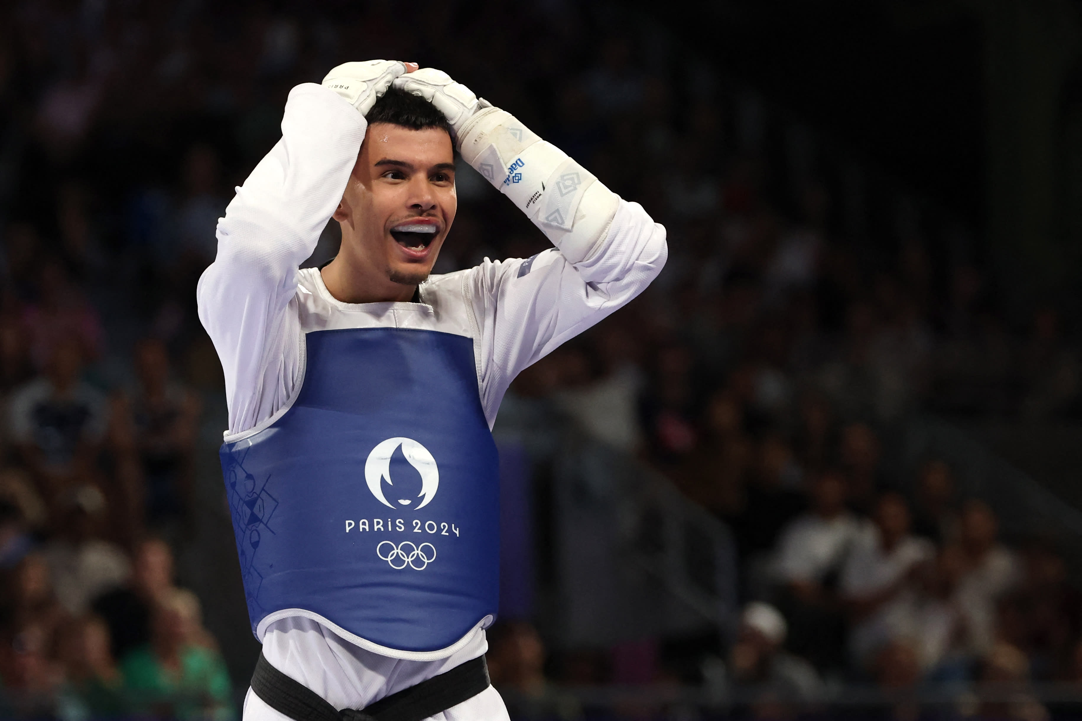 Denmark's Edi Hrnic celebrates his victory against South Korea's Seo Geon-woo in the men's taekwondo -80 kg bronze medal match at the 2024 Paris Olympic Games on August 9, 2024 at the Grand Palais in Paris. (David Gray/AFP/Getty Images)