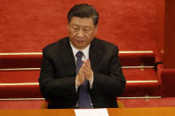 Chinese President Xi Jinping attends the closing session of the Chinese People's Political Consultative Conference (CPPCC) at the Great Hall of the People in Beijing Wednesday, May 27, 2020. (AP Photo/Andy Wong)