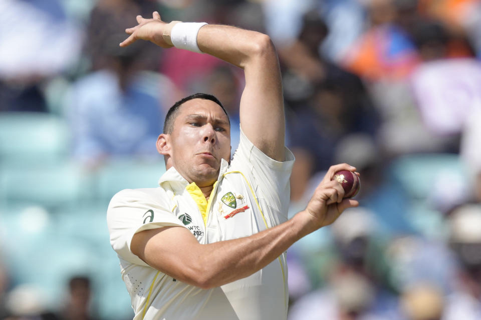 Australia's Scott Boland bowls on the fourth day of the ICC World Test Championship Final between India and Australia at The Oval cricket ground in London, Saturday, June 10, 2023. (AP Photo/Kirsty Wigglesworth)