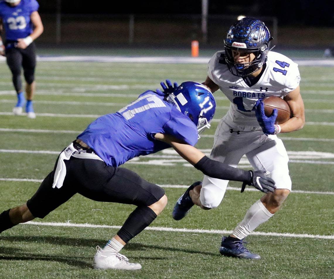 Weatherford defender Xavier Holder (17) brings down Byron Nelson’s Landon Ransom-Goelz (14) in a 6A Division 2 bi-district football playoff game at Kangaroo Stadium in Weatherford, Texas, Friday Nov. 12, 2021. Byron Nelson led 21-7 at the half. (Special to the Star-Telegram Bob Booth)