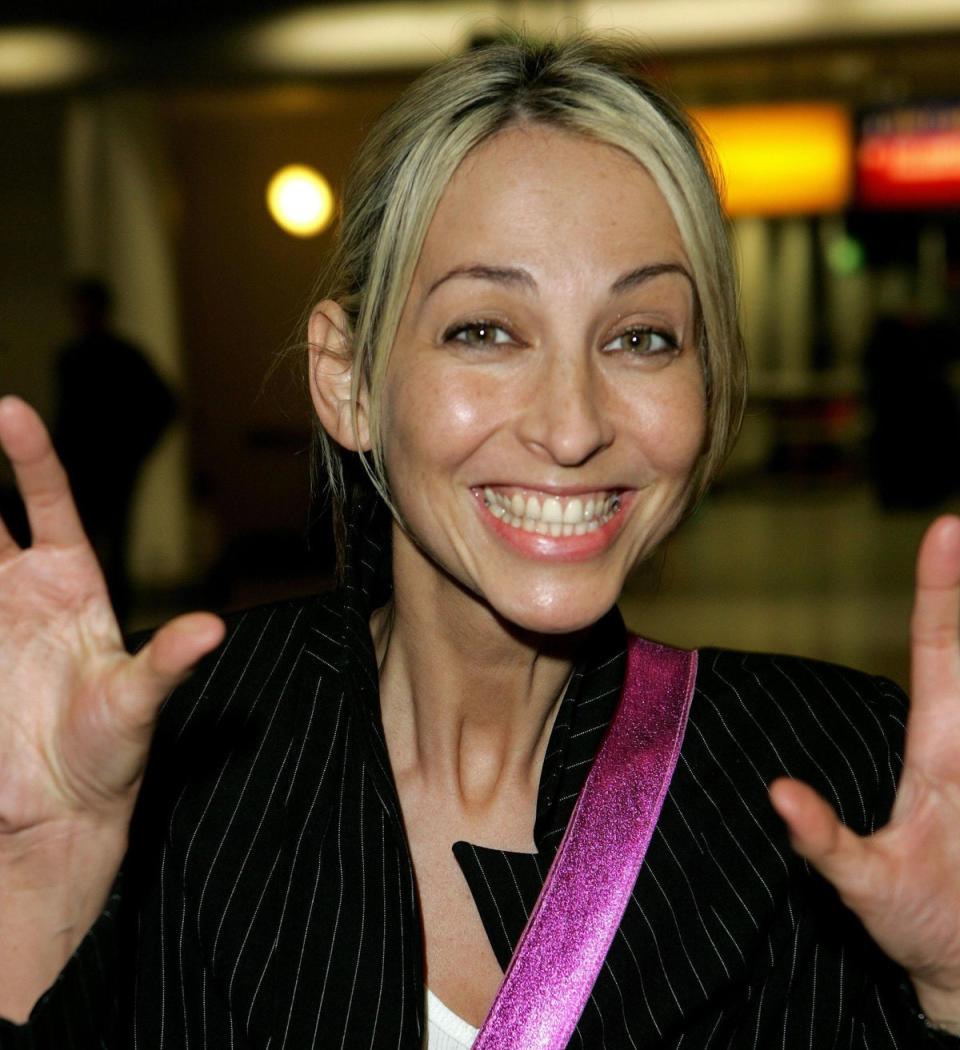 Natalie Appleton at London's Heathrow Airport before flying out to Australia in 2004 (PA)
