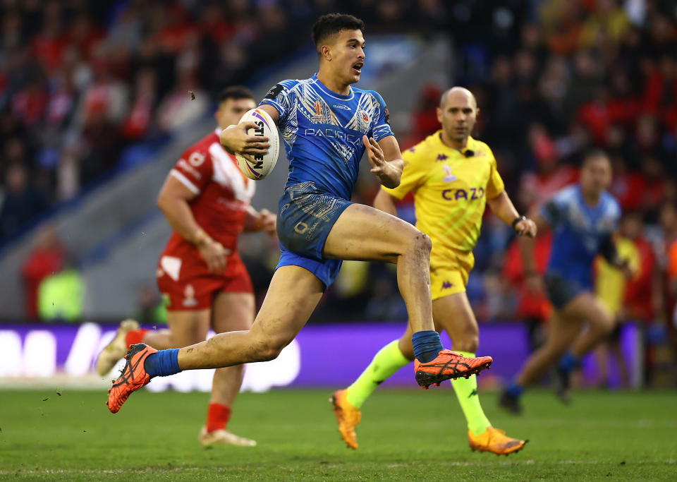 Seen here, Samoa's Joseph Suaali’i breaking clear of the Tongan defence during his side's Rugby League World Cup quarter-final triumph. 