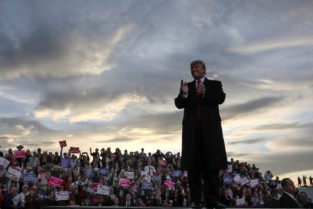 U.S. President Donald Trump rallies with supporters in a hangar at Missoula International Airport in Missoula, Montana, U.S. October 18, 2018. REUTERS/Jonathan Ernst