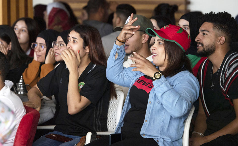 Fans in Morocco, pictured here watching their clash with Belgium at the World Cup.