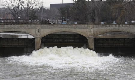 The Flint river is seen flowing through downtown Flint in Flint, Michigan February 7, 2016. REUTERS/Rebecca Cook