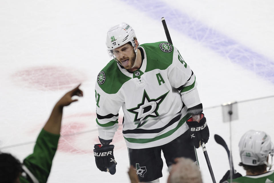 Dallas Stars center Tyler Seguin (91) reacts after scoring a goal against the Minnesota Wild during the third period of Game 4 of an NHL hockey Stanley Cup first-round playoff series Sunday, April 23, 2023, in St. Paul, Minn. (AP Photo/Stacy Bengs)