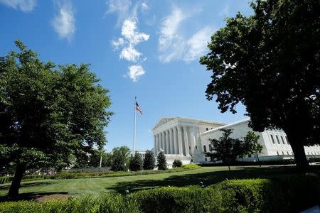 The building of the U.S. Supreme Court is seen after it granted parts of the Trump administration's emergency request to put his travel ban into effect immediately while the legal battle continues, in Washington, U.S., June 26, 2017. REUTERS/Yuri Gripas