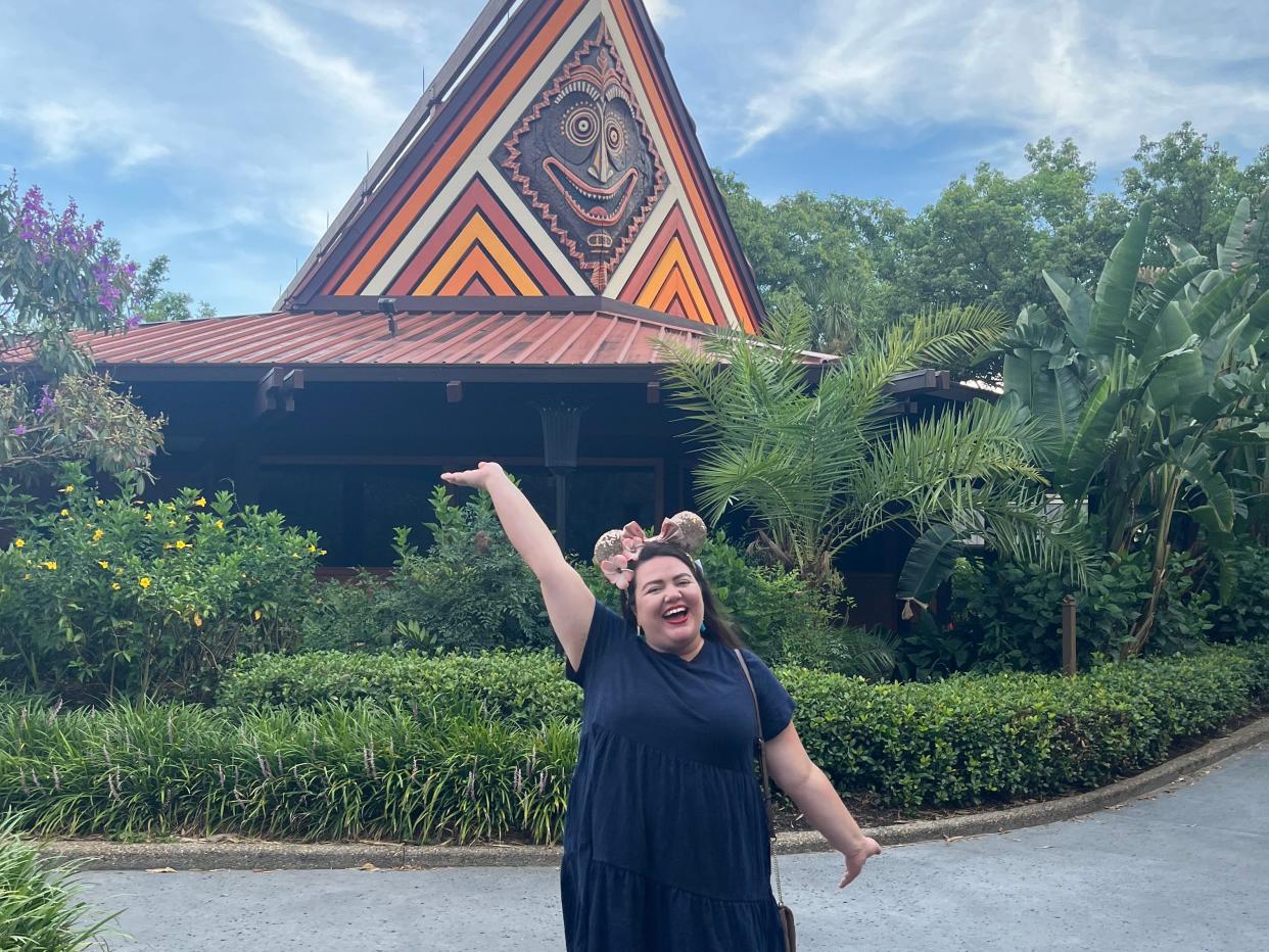 megan posing in front of disney's polynesian resort