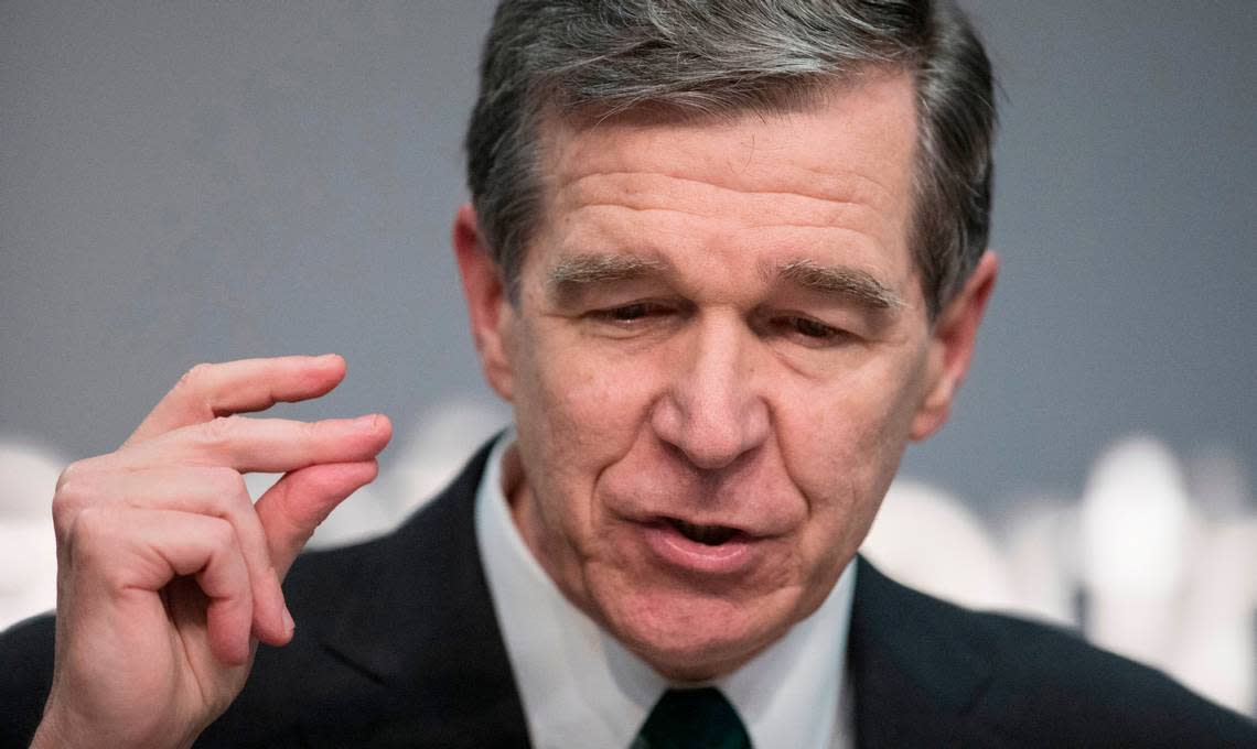 Gov. Roy Cooper says “We could do it just like that” snapping his fingers as he encourages the Legislature to approve Medicaid expansion. Cooper was speaking at a press conference announcing his budget proposal Wednesday, Aug. 26, 2020.