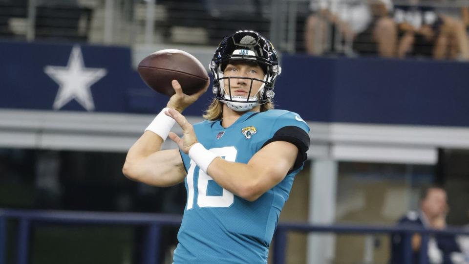 Jacksonville Jaguars quarterback Trevor Lawrence throws the football.