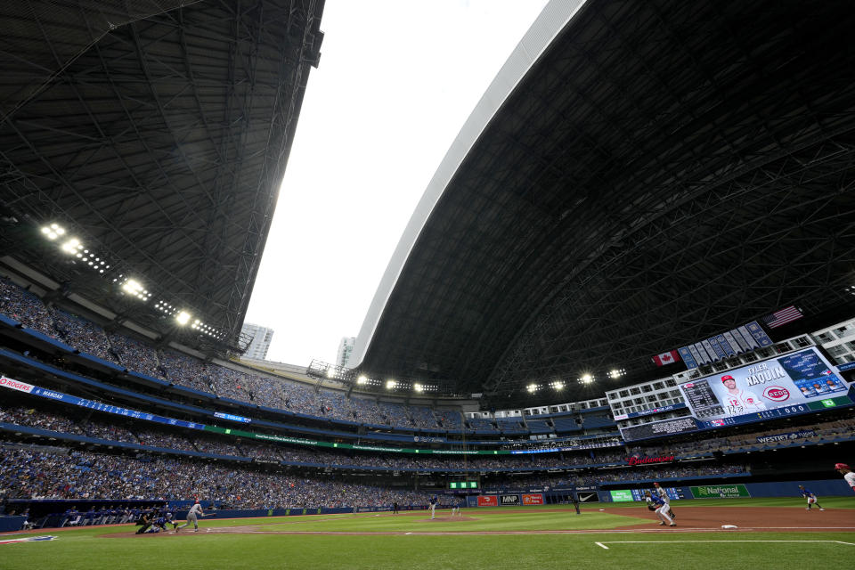 The roof is opened at the Rogers Centre following a storm that passed over the city during the fourth inning of a baseball game between the Toronto Blue Jays and the Cincinnati Reds in Toronto, Saturday, May 21, 2022. (Frank Gunn/The Canadian Press via AP)