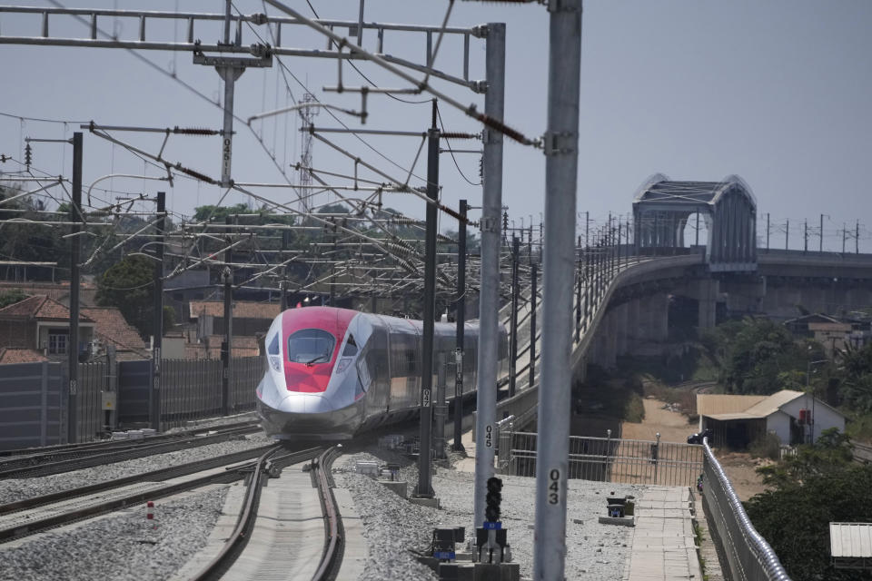 High-speed train is seen during the opening ceremony for launching Southeast Asia's first high-speed railway at Padalarang station in Bandung, West Java, Indonesia, Monday, Oct. 2, 2023. Indonesian President Joko Widodo launched Southeast Asia's first high-speed railway that will start its commercial operations on Monday, a key project under China's Belt and Road infrastructure initiative that will cut travel time between two cities from the current three hours to about 40 minutes. (AP Photo/Achmad Ibrahim)