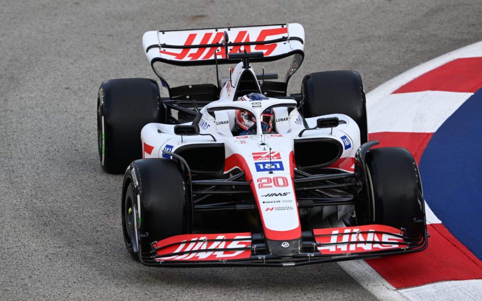 Haas F1 Team's Danish driver Kevin Magnussen drives during a practice session ahead of the Formula One Singapore Grand Prix night race at the Marina Bay Street Circuit in Singapore on September 30, 2022 - AFP