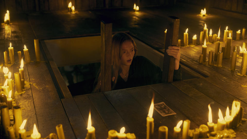 This image released by Sony Pictures shows Larsen Thompson in a scene from "Tarot" (Slobodan Pikula/Columbia-Sony Pictures via AP)