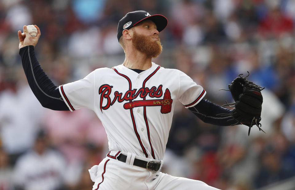 Atlanta Braves starting pitcher Mike Foltynewicz (26) delivers during the first inning in Game 4 of baseball's National League Division Series between the Atlanta Braves and the Los Angeles Dodgers, Monday, Oct. 8, 2018, in Atlanta. (AP Photo/John Bazemore)
