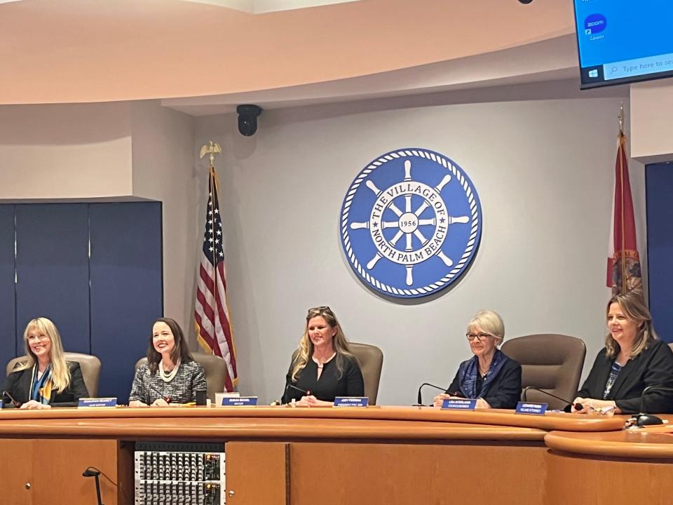 The five council members making up the first all-women council in North Palm Beach, Fla., beam with smiles after two new members are sworn in on Thursday, March 14, 2024. From left to right: Kristin Garrison, Deborah Searcy, Susan Bickel, Judy Pierman and Lisa Interlandi.