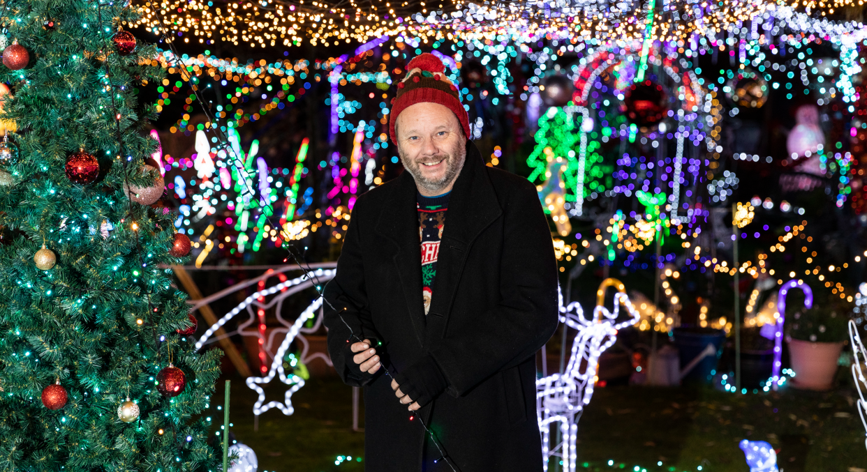 Nigel Watkinson pictured in front of the Christmas lights his garden in Scarborough, North Yorkshire