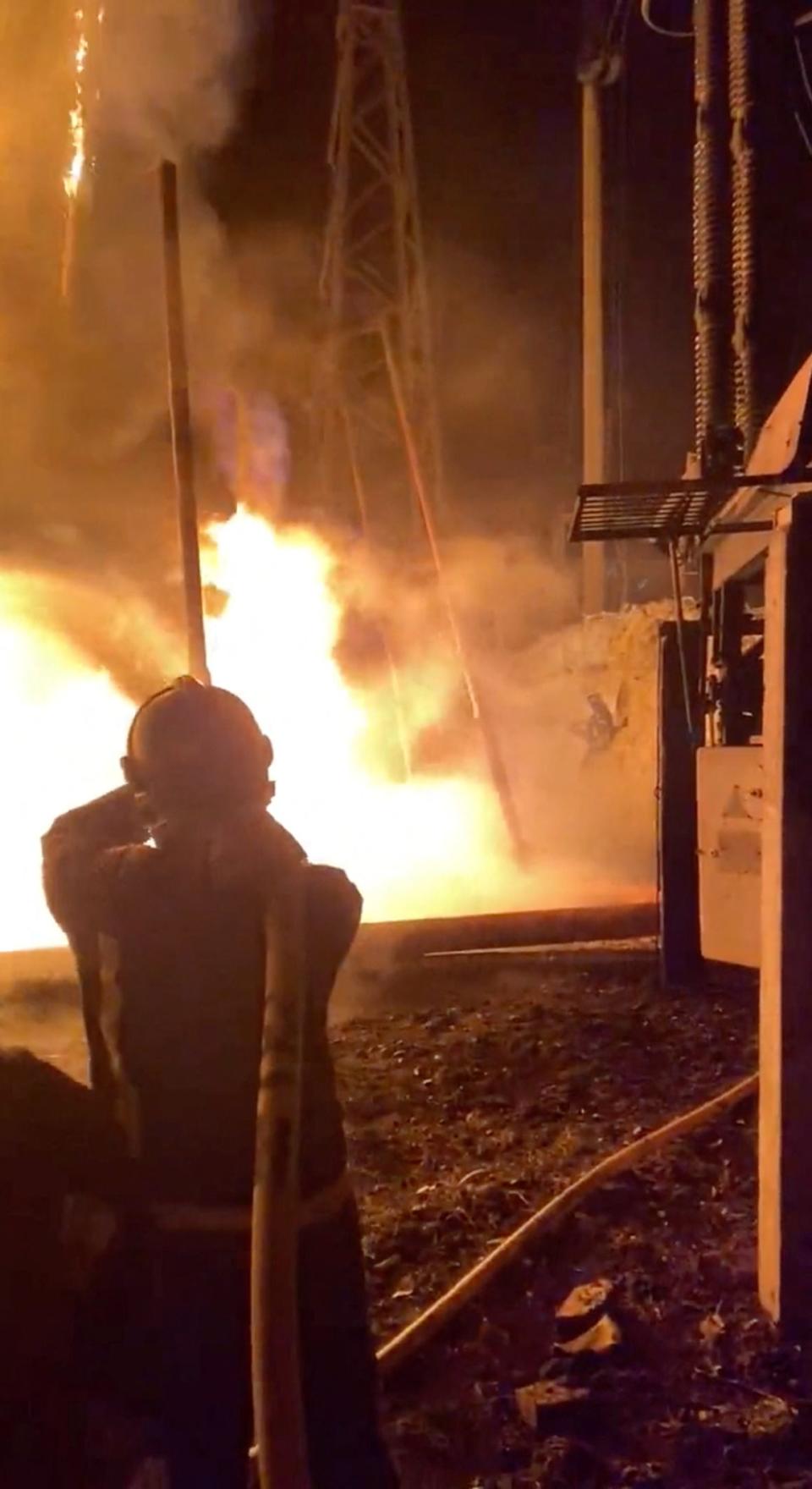 <div class="inline-image__title">UKRAINE-CRISIS/FIRE</div> <div class="inline-image__caption"><p>Firefighters work to contain a fire that broke out after a Russian strike at an electricity station, in Kharkiv, Ukraine, in this screen grab from a video released on December 29, 2022. </p></div> <div class="inline-image__credit">Twitter/@FireFighterUA via Reuters</div>
