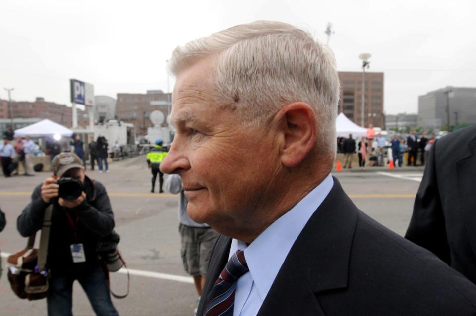 <div class="inline-image__caption"><p>William Bulger exits John Joseph Moakley United States Courthouse following the arraignment of his brother James "Whitey" Bulger and his girlfriend Catherine Greig June 24, 2011, in Boston, Massachusetts. </p></div> <div class="inline-image__credit">Darren McCollester/Getty</div>