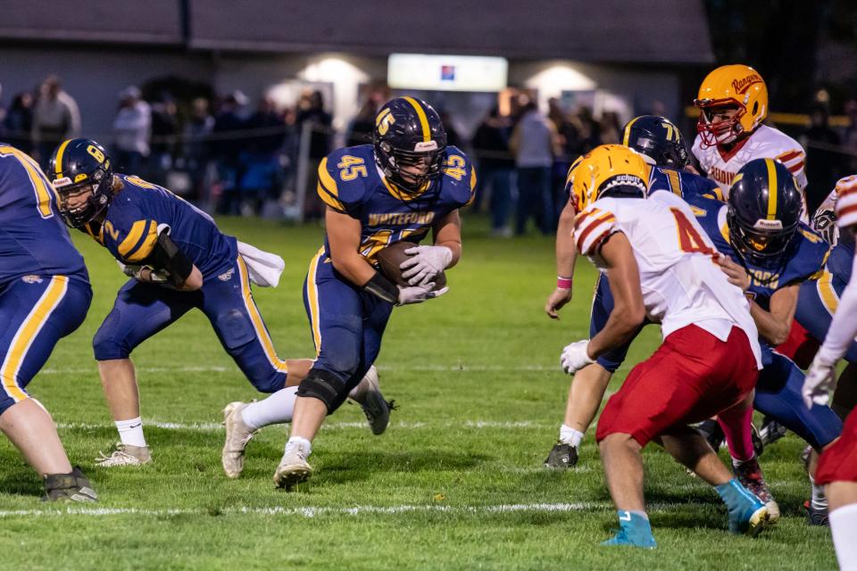 Drew Knaggs carries the ball for Whiteford during a 58-0 rout of Reading Friday night. The Bobcats ran their record to 7-0.