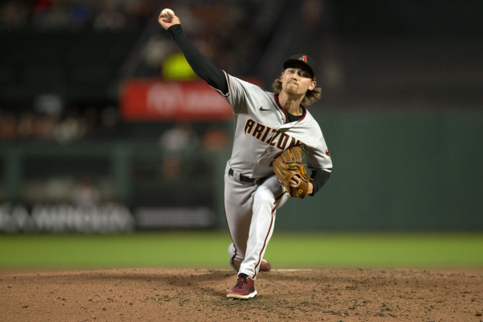 Arizona Diamondbacks starting pitcher Luke Weaver (24) delivers a pitch against the San Francisco Giants during the first inning of a baseball game, Tuesday, Sept. 28, 2021, in San Francisco. (AP Photo/D. Ross Cameron)