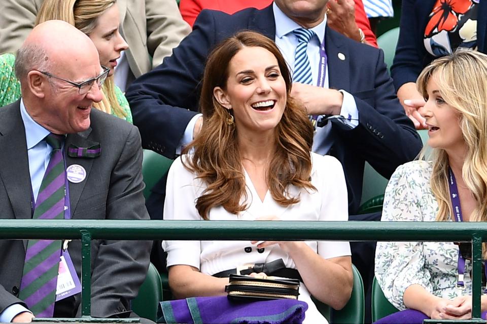 Britain's Catherine, Duchess of Cambridge (C) sits in the crowd on No 1. Court at The All England Tennis Club in Wimbledon, southwest London, on July 2, 2019, on the second day of the 2019 Wimbledon Championships tennis tournament. (Photo by Daniel LEAL-OLIVAS / AFP) / RESTRICTED TO EDITORIAL USE        (Photo credit should read DANIEL LEAL-OLIVAS/AFP/Getty Images)