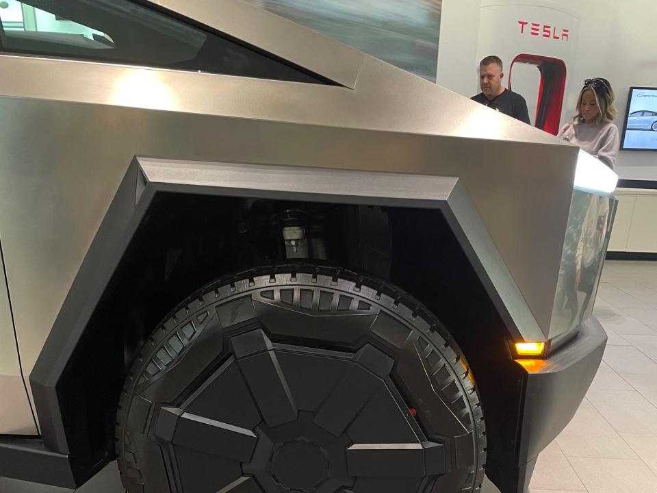 The front wheel of a Tesla Cybertruck at the company's Santana Row showroom in San Jose on December 9, 2023.