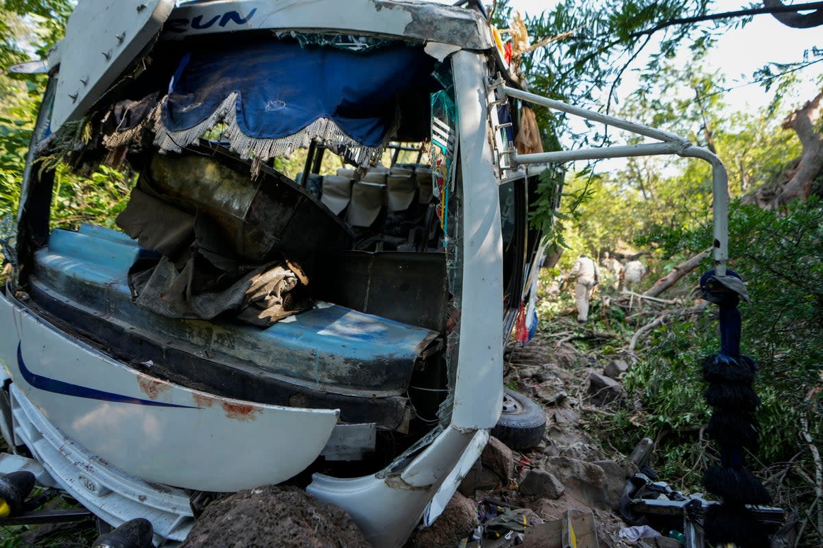 Wreckage of the bus attacked by gunmen in Reasi, India, on 10 June 2024 (AP)