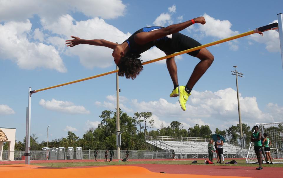 Kaiden Crossdale from Ida Baker clears a high jump at the FHSAA 3A District 11 track & field meet at Dunbar High School on April 20, 2023. He won.  