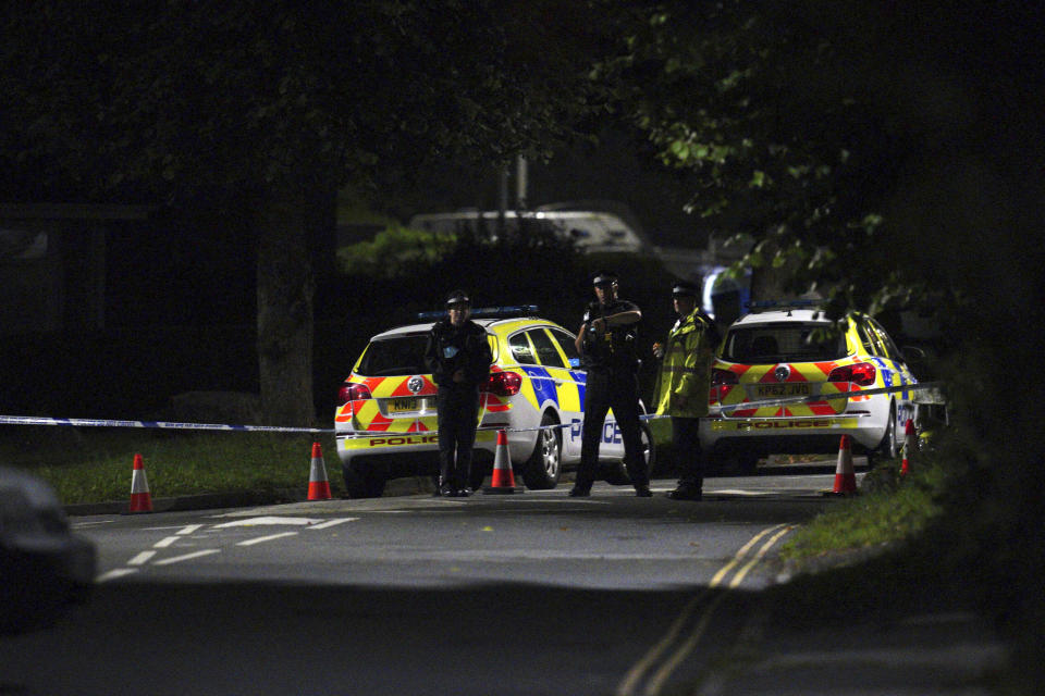 Emergency services are seen near the scene of incident on Biddick Drive, in the Keyham area of Plymouth, southwest England, Thursday, Aug. 12, 2021. Police in southwest England said several people were killed, including the suspected shooter, in the city of Plymouth Thursday in a “serious firearms incident” that wasn't terror-related. (Ben Birchall/PA via AP)