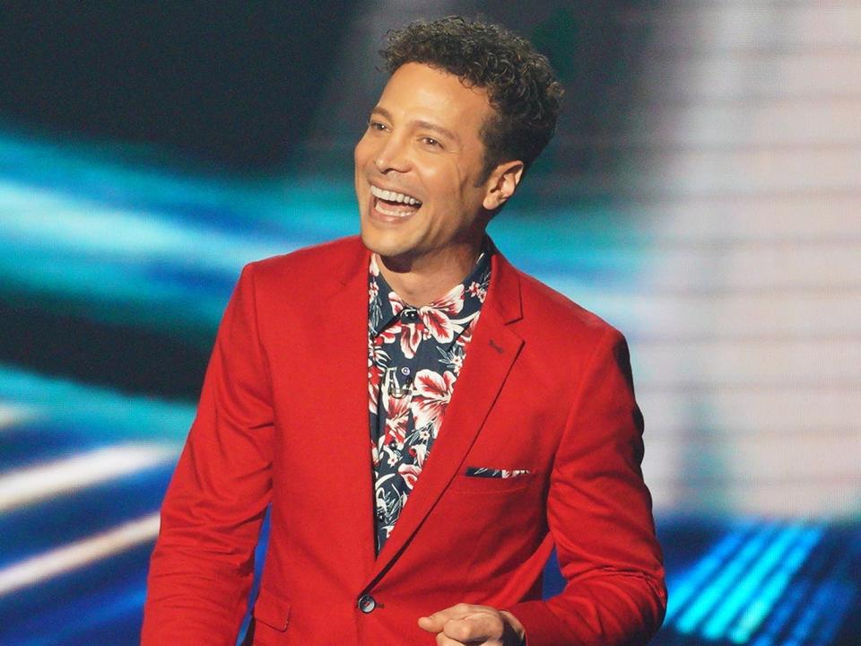 justin guarini on the american idol stage in 2022 for the 20th anniversary celebration