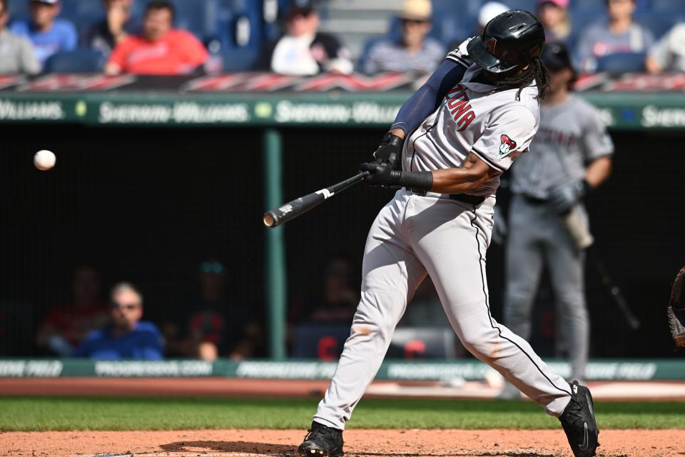 Aug 7, 2024; Cleveland, Ohio, USA; Arizona Diamondbacks first baseman Josh Bell (36) hits a home run during the third inning against the Cleveland Guardians at Progressive Field. Mandatory Credit: Ken Blaze-USA TODAY Sports