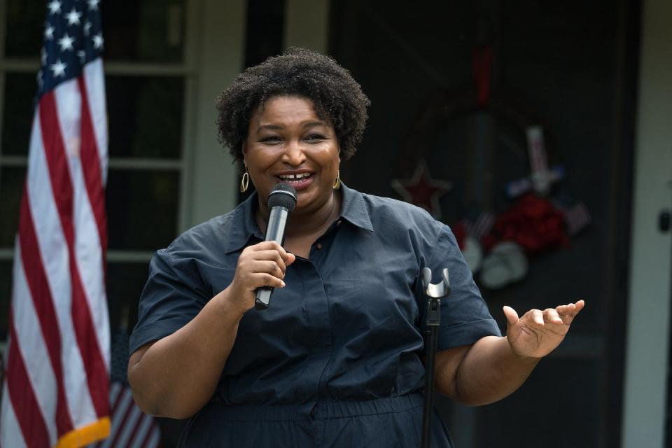 Georgia gubernatorial candidate Stacey Abrams speaks to supporters on July 28, 2022. <a href="https://www.gettyimages.com/detail/news-photo/georgia-gubernatorial-candidate-stacey-abrams-speaks-to-news-photo/1242171129?phrase=Georgia%27s%20Gubernatorial%20Election&adppopup=true" rel="nofollow noopener" target="_blank" data-ylk="slk:Megan Varner/Getty Images;elm:context_link;itc:0;sec:content-canvas" class="link ">Megan Varner/Getty Images</a>